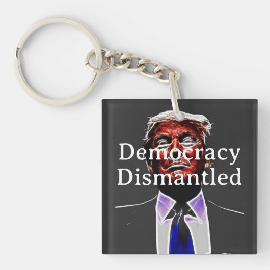 Sleutelhanger 'Democratie ontmanteld' (voorkant)