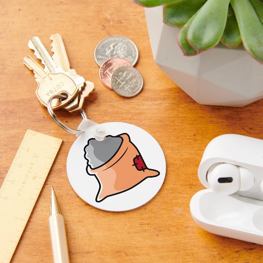 Sleutelhanger in de bodem