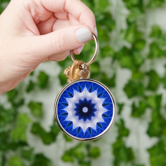 Sleutelhanger met blauw wiel rond (Hand)