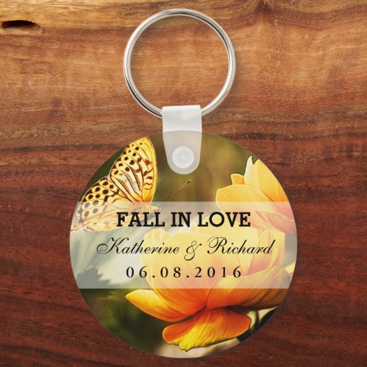 Sleutelhanger met geelbloem en vlinderbruiloft (Voorkant)