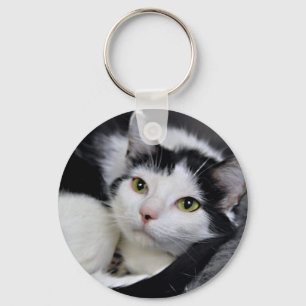 Sleutelhanger met middelhoge haarklop (zwart en wi