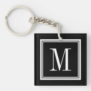 Sleutelhanger met monogramletter en achtergrond in