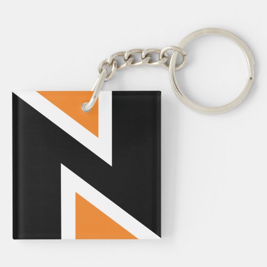 Sleutelhanger met Oranje en zwarte letters (Achterkant)