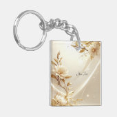 Sleutelhanger met witte en gouden bloemen (Voorkant Links)