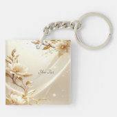 Sleutelhanger met witte en gouden bloemen (Achterkant)