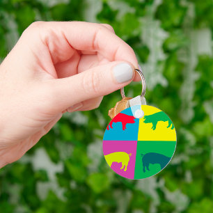 Sleutelhanger van kleurrijke varkens