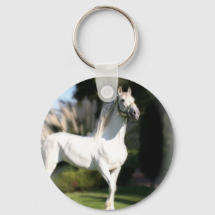 Sleutelhanger van witte paarden