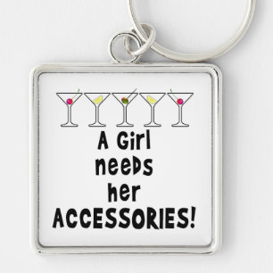 SLEUTELHANGERS, EEN MEISJE BEHOEFT HAAR ACCESSOIRE SLEUTELHANGER