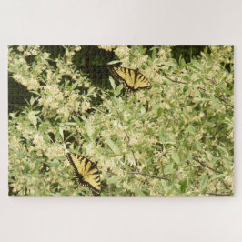 Slib-vlinders op bloeiende struikgewas legpuzzel
