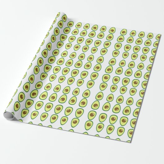 Slicte groene avocado op wit cadeaupapier (Uitgerold)