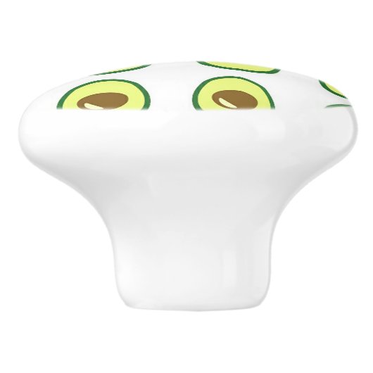 Slicte groene avocado op wit keramische knop (Zijkant)