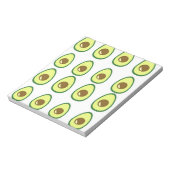 Slicte groene avocado op wit notitieblok (Linkerzijde)