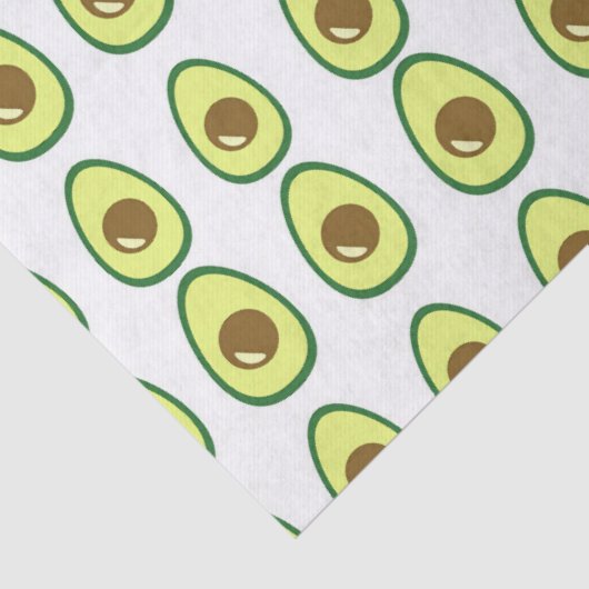 Slicte groene avocado op wit tissuepapier (Detail)