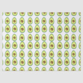 Slicte groene avocado op wit tissuepapier (Voorkant)