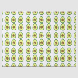 Slicte groene avocado op wit tissuepapier