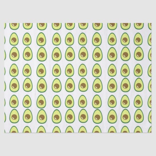 Slicte groene avocado op wit tissuepapier (Voorkant)