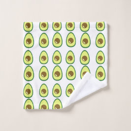 Slicte groene avocado op wit washandje