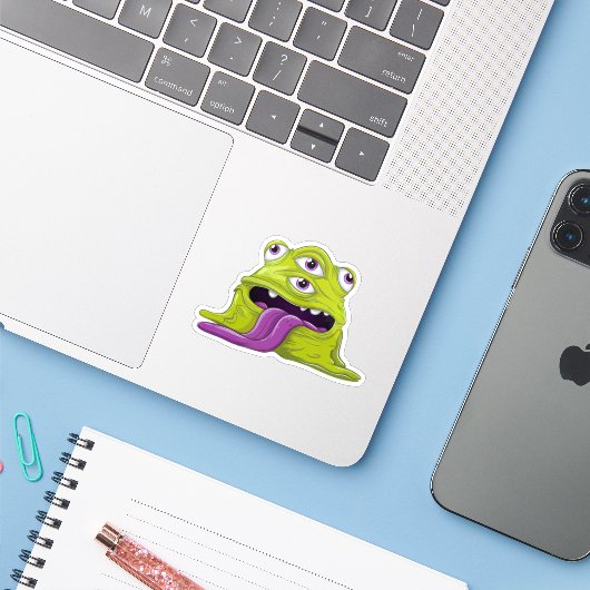 slijmerig monster sticker (Laptop met iPhone)