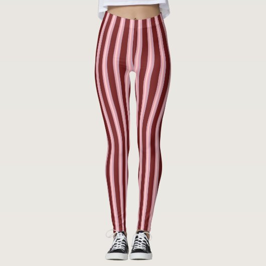Slim-uitziende verticale roze strepen op maroon leggings (Voorkant)