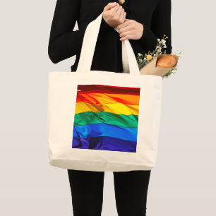 SlipperyJoe's gay pride vlag zwaaiend rood oranje Grote Tote Bag