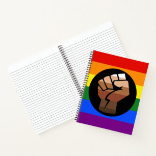 SlipperyJoe's regenboogkleuren vlag opgeheven vuis Notitieboek