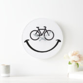 Slogan fiets met blij gezicht. Blij lach gezicht. Grote Klok (Huis)