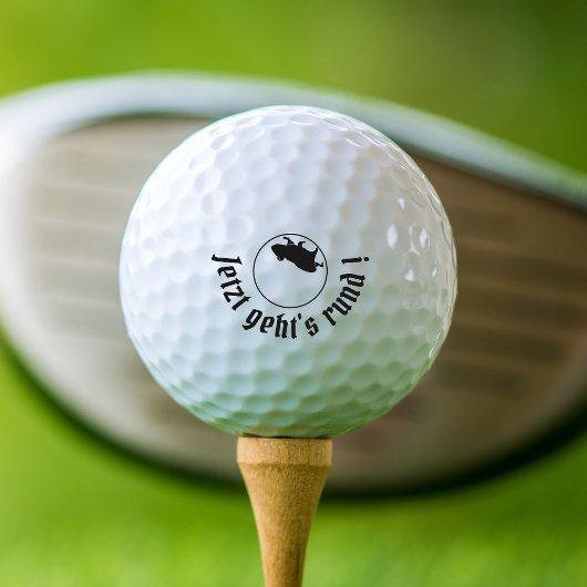 Slogan Jetzt geht's round Golfballen