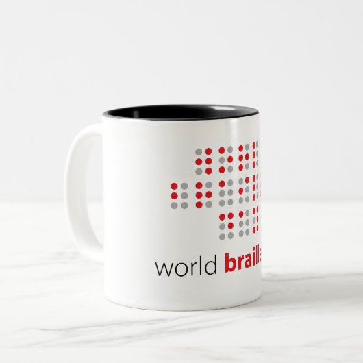 Slogan World braille day. Wereld braille dag. Tweekleurige Koffiemok (Voorkant links)