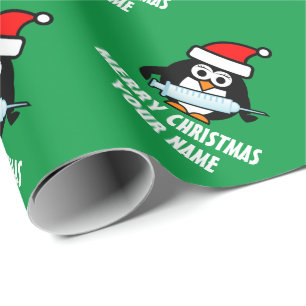 Sluimerpinguïn met kerstspuit cadeaupapier