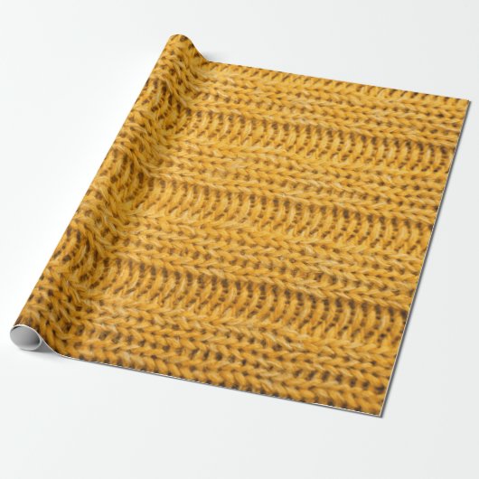 Sluit de geel gebreide getextureerde achtergrond. cadeaupapier (Uitgerold)