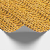 Sluit de geel gebreide getextureerde achtergrond. cadeaupapier (Hoek)