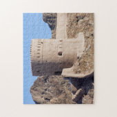 Sluit een horlogetoren in het oude Muscat-Oman. Legpuzzel (Verticaal)