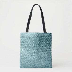 Sluit groene gebreide textureerde achtergrond.  tote bag