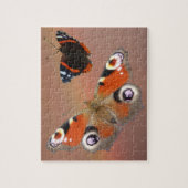 Sluit Puzzle af: Peacock en Atalanta Butterfly Legpuzzel (Verticaal)