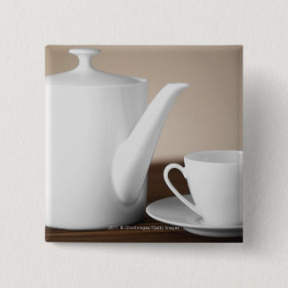 Sluiten van een beker en een saucer met een theeke vierkante button 5,1 cm