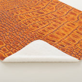 Sluiten van een bruine,  ledertextuur met een rept sherpa deken (3/4)