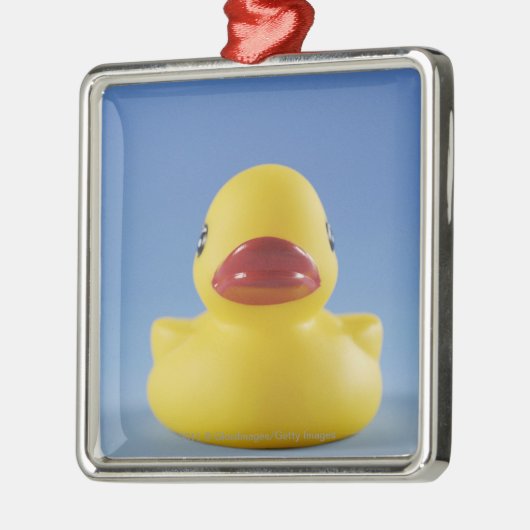 Sluiten van een rubbereend metalen ornament (Links)