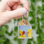Sluiten van twee rubbereenden sleutelhanger (Hand)