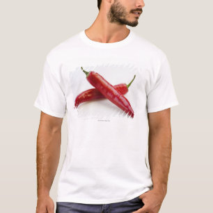 Sluiten van witte rode pepers t-shirt