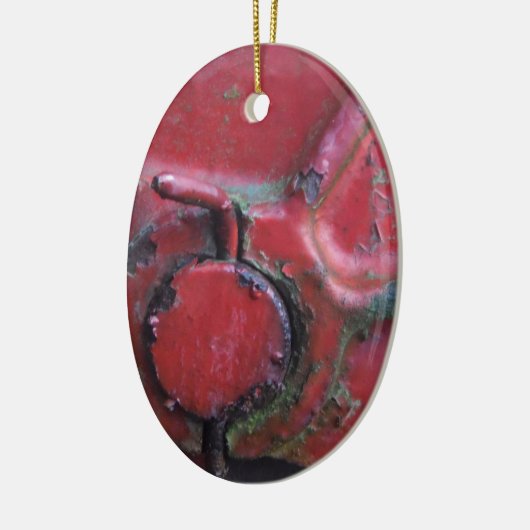Sluiting van de roodroodroedel keramisch ornament (Links)