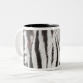 Sluiting van de zebra tweekleurige koffiemok (Voorkant links)