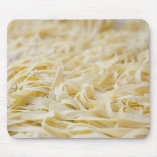 Sluiting van deegnoedels muismat (Voorkant)