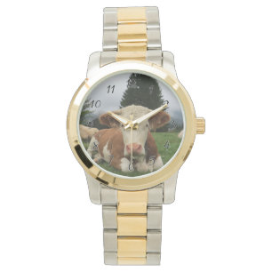Sluiting van een bruine en witte koe horloge