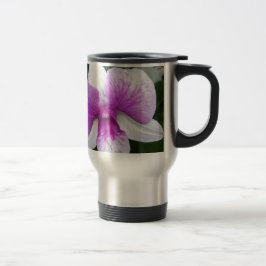 sluiting van een mooie paarse en witte orchidee reisbeker