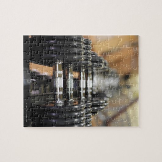 Sluiting van een rij dumbels legpuzzel (Horizontaal)