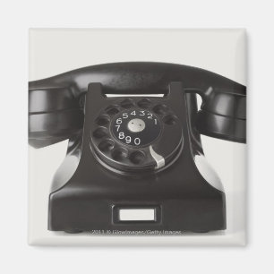 Sluiting van een roterende telefoon magneet