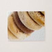 Sluiting van een stapel geassembleerde bagels legpuzzel (Horizontaal)