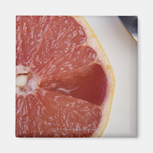 Sluiting van een stuk sinaasappel en een lepel magneet (Voorkant)