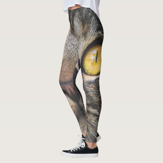 Sluiting van kat met gele ogen leggings (Links)