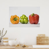 Sluiting van paprika's op rij poster (Keuken)